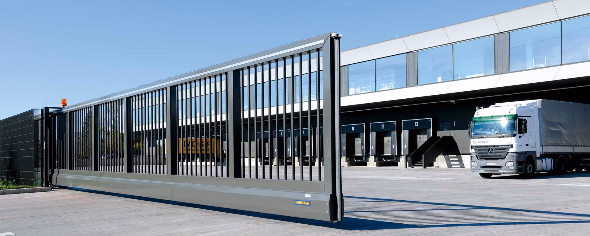 Porta corredissa industrial de 2 fulles
